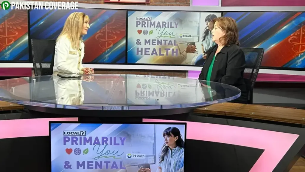 Liz Bonis explaining a health topic on air with visuals and expert clarity