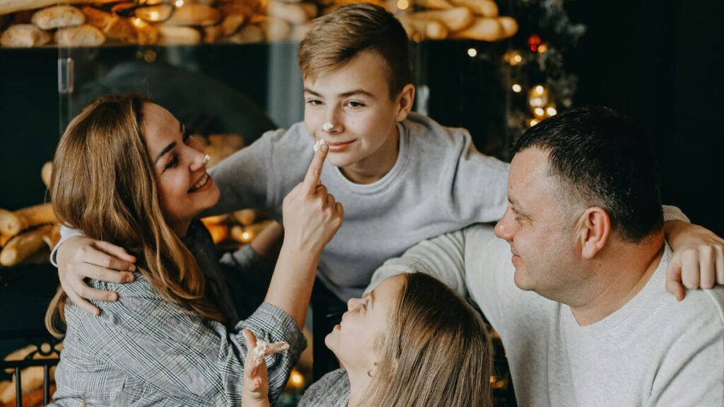 Happy family bonding together in a cozy setting, symbolizing strong relationships and positive parenting.