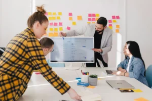 Illustration of a diverse team following a digital SOP checklist in a modern office setting for operational efficiency