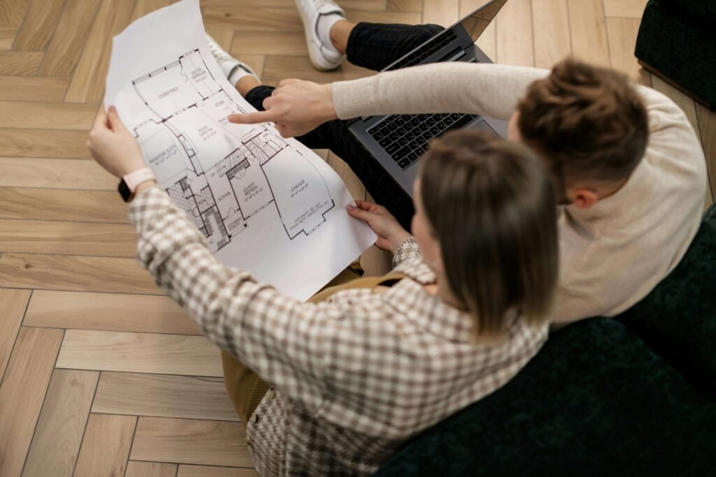 Couple discussing home layout, symbolizing Wutawhelp’s approach to smart home planning