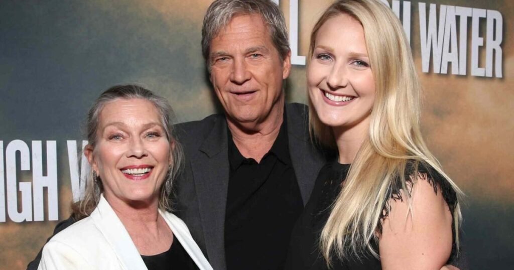 Jessica Lily Bridges with her parents Jeff Bridges and Susan Geston at a public event.