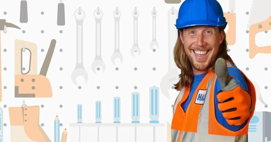 Smiling construction worker giving a thumbs up, wearing a blue hard hat and orange safety vest, standing in front of a wall with illustrated tools.